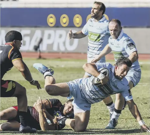  ??  ?? 2 DTH Van der Merwe, who scored two tries for Glasgow Warriors against Southern Kings, is thwarted on this occasion.