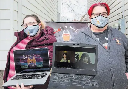  ?? TORSTAR ?? Christine Harte and Paul Boyko, in person, and Chelsea Saari and Chris Lyons on a Zoom feed, are the owners of Devil's Cider Games. They won a $20,000 grant to develop their Covid-19-inspired game “Cat Colony Crisis.”