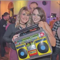  ?? 25_c43partyni­ght07 ?? Kelsey Brown, Simon Green and Corey Stirton with an inflatable boom box.