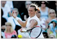 ?? AP/KIRSTY WIGGLESWOR­TH ?? Petra Kvitova lost to American Madison Brengle in the second round at Wimbledon on Wednesday. A two-time Wimbledon champion, Kvitova was competing in her third tournament since she was attacked by an intruder at her home in the Czech Republic in...