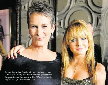  ?? CARLO ALLEGRI /TNS, file ?? Actress Jamie Lee Curtis, left, and Lindsay Lohan, stars of the Disney film ‘Freaky Friday,’ pose before the premiere of the movie at the El Capitan theater Aug. 4, 2003, in Hollywood, Calif.