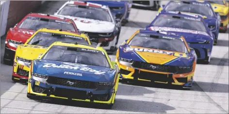  ?? WADE PAYNE/AP ?? RYAN BLANEY (12) leads the field to start a Cup Series auto race on March 17 in Bristol, Tenn.