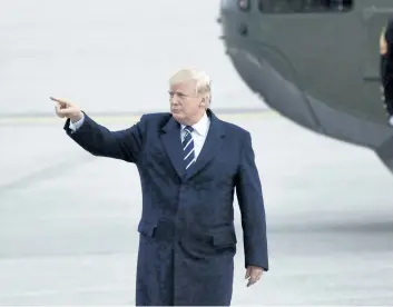  ?? SUSAN WALSH/ THE ASSOCIATED PRESS ?? U. S. President Donald Trump gestures as he walks towards Air Force One at John F. Kennedy Internatio­nal Airport in New York, on Saturday.