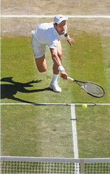  ??  ?? All grace: Watch Novak Djokovic stretch to retrieve a ball. The beauty is in the effort, not necessaril­y in the effect.afp