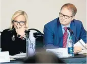  ?? MIKE STOCKER/SUN SENTINEL ?? Florida Sen. Lauren Book and Ryan Petty, father of shooting victim Alaina Petty, listen to videos from the school shooting during the Marjory Stoneman Douglas High School Public Safety Commission meeting Thursday.