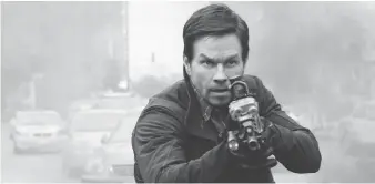  ?? STXFILMS ?? Mark Wahlberg’s action movie Mile 22 finished a distant third at the weekend box office.