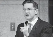  ??  ADRIAN WYLD /THE CANADIAN PRESS FILES ?? Employment Minister Pierre Poilievre says the timing of the new payments was related to setting up of federal systems to handle the expanded eligibilit­y.