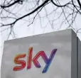  ??  ?? IN THIS file photo taken on March 17, 2017 a Sky logo is pictured on a sign next to the entrance to pay-TV giant Sky Plc’s headquarte­rs in Isleworth, west London. Rupert Murdoch’s 21st Century Fox on Wednesday, July 11, revealed it had increased a...