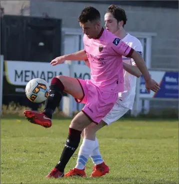  ??  ?? Wexford F.C. midfielder Thomas C roke protects the ball from Evan Farrell of U.C.D.