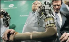  ?? GETTY IMAGES FILES ?? Bionic limbs could help disabled people re-enter the workforce, but one expert says society needs to be aware of unintended consequenc­es.