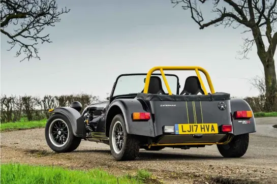  ??  ?? Right, from top: 1.6-litre unit puts out 152bhp; quick-release wheel is an option; race seats part of R pack. Above: hopefully we’ll mostly be driving our Seven like this – without the hood and doors