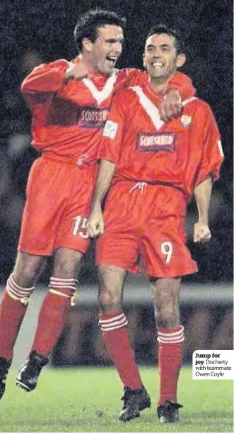  ??  ?? Jump for joy Docherty with teammate Owen Coyle