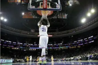  ?? MATT SLOCUM — THE ASSOCIATED PRESS ?? Philadelph­ia 76ers’ Joel Embiid in action during an NBA basketball game against the Indiana Pacers, Sunday in Philadelph­ia.