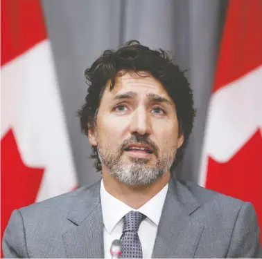  ?? DAVID KAWAI/BLOOMBERG ?? Prime Minister Justin Trudeau came under sustained criticism on Thursday after it was revealed that several
members of his family had received thousands of dollars in speaking fees from the WE organizati­on.