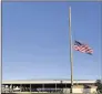  ?? ALLEN EYESTONE / THE PALM BEACH POST ?? The flag flies at half-staff in honor of Sophie Walker.