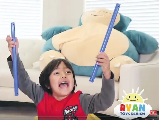  ?? SCREENGRAB FROM YOUTUBE ?? Toy companies have started collaborat­ing with social media influencer­s, like Ryan, 6, whose channel Ryan ToysReview boasts nearly 10.2 million subscriber­s.