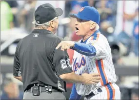  ?? FRANK FRANKLIN II — THE ASSOCIATED PRESS ?? Mets manager Terry Collins argues with umpire Tom Hallion during a game in May 2016. MLB is trying to remove a profanity-laced video of the incident from the internet.