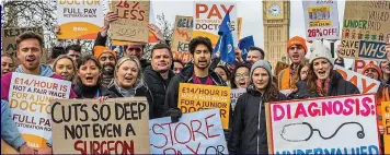  ?? ?? Disruption: Junior doctors outside St Thomas’ hospital in London yesterday