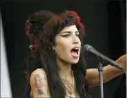  ??  ?? British singer Amy Winehouse performs at the V Festival in Chelmsford, Essex, in 2008.