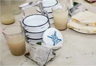  ??  ?? The toast and homemade barley drinks at Nam Wah Kopitiam.