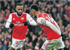  ?? Picture: Daniel LEAL-OLIVAS/AFP ?? Arsenal striker Alexandre Lacazette (left) celebrates with Pierre-Emerick Aubameyang after scoring their first goal against Southampto­n.