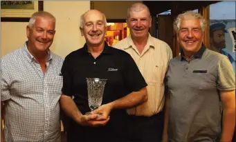  ??  ?? The Three Bullet Gate Society presentati­on of the Phyllis O’Riordan trophy (from left): Ger O’Riordan, John Kehoe (winner), Bob O’Riordan, Michael Lee (Captain).