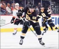  ?? Tim Nwachukwu / Getty Images ?? Erik Haula of the Boston Bruins controls the puck during the third period against the Philadelph­ia Flyers at Wells Fargo Center on Wednesday in Philadelph­ia.