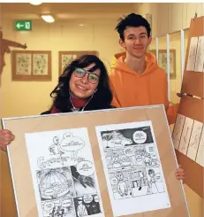  ?? FOTO: UWE MISERIUS ?? Cristina Gobej (14) und Henk Schönheit (17) zum Beispiel zeigen ihre Antihelden-Comics.