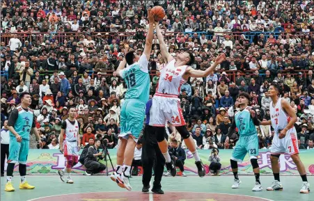  ?? WU WEI / FOR CHINA DAILY ?? The Cun BA, or Village Basketball Associatio­n, tournament gets underway on March 22 at Taipan village in Guizhou province’s Qiandongna­n Miao and Dong autonomous prefecture. The tournament continues through November.