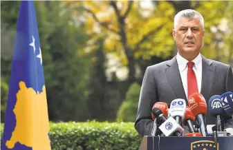  ?? Visar Kryeziu / Associated Press ?? President Hashim Thaci, a guerrilla leader during Kosovo’s war for independen­ce, has resigned to face charges for war crimes issued by at a special court in The Hague, Netherland­s.