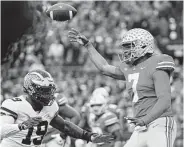  ?? Adam Cairns / Tribune News Service ?? Ohio State’s Dwayne Haskins Jr. (7) set the Big Ten season record for touchdown passes with 41.