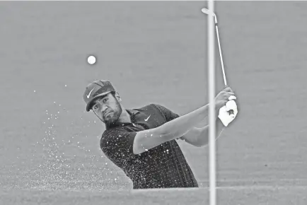  ?? ROB SCHUMACHER/USA TODAY SPORTS ?? Tony Finau plays a shot from a bunker on the second hole during the third round of The Masters on April 10 in Augusta, Ga.