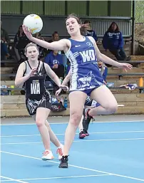  ?? ?? Above: Tahlia Ramm gets some air time as she drives Neerim South down the court in B grade. Neerim South won 70-19.