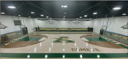  ?? COURTESY OF CASEY WOLF ?? Amherst’s gym renovation­s were completed around July 14, replacing the floor, bleachers, and repainting walls.