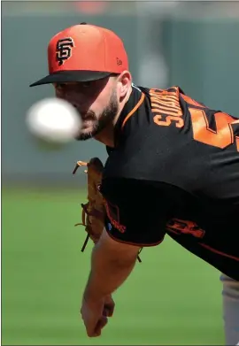  ?? MATT KARTOZIAN – USA TODAY SPORTS ?? The Giants’ Andrew Suarez pitched 31⁄3 effective innings against the Padres on Saturday. Suarez made 29starts last season and is hoping to crack this year’s opening day roster.