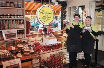  ??  ?? Staff members Annette Cashe and Nicola O’Brien Joanne’s cafe with their award winning confection­ary.