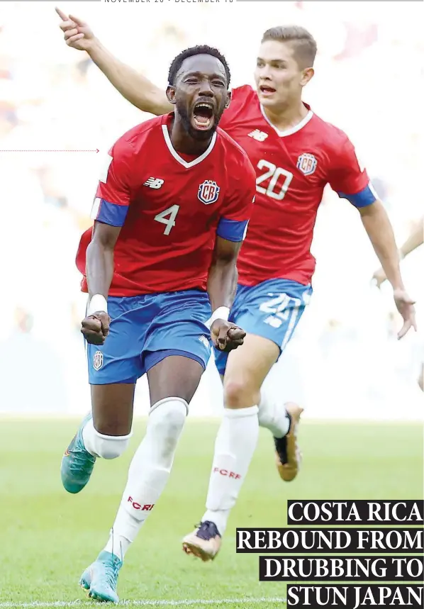  ?? ?? Costa Rica’s #4 KEYSHER FULLER celebrates scoring their first goal with #20 BRANDON AGUILERA
