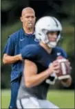 ?? JOE HERMITT — THE PATRIOT-NEWS VIA AP ?? Penn State head coach James Franklin looks on as quarterbac­k Trace McSorley takes the snap during NCAA college football practice on Wednesday.