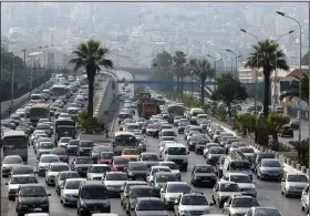  ?? (AP file photo) ?? Traffic is clogged on a road in Algiers, Algeria, in 2010. The country halted the sale of leaded gasoline last month.