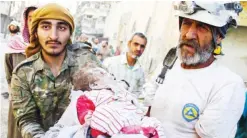  ?? AFP ?? ALEPPO: Members of the Syrian Civil Defense, known as the White Helmets, carry the body of a girl dug out from the rubble of a destroyed building following air strikes in the rebel-held Qatarji neighborho­od of this northern Syrian city yesterday.—