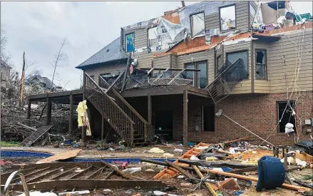  ?? BUTCH DILL/ASSOCIATED PRESS ?? A home sustained heavy damage Thursday when a tornado hit Eagle Point subdivisio­n near Birmingham, Alabama. Gov. Kay Ivey issued an emergency declaratio­n for 46 counties as the severe weather neared, and officials opened shelters in and around Birmingham.