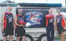  ?? V1 - BULE01Z01M­A ?? David Lindsay, Andy Pethybridg­e, Ian Blakey and Tony Burke from AFL Masters Townsville Inc in front of their newly-finished club trailer. Picture: Patrick Woods