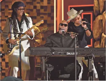  ?? ROBERT HANASHIRO, USA TODAY ?? Nile Rodgers, Stevie Wonder, Pharrell Williams and Daft Punk’s 2014 Grammy performanc­e is one of LL Cool J’s top picks.