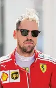  ?? Foto: afp ?? Die Sonnenbril­le gehört auch bei Sebas tian Vettel in Monaco zur Standard ausrüstung.