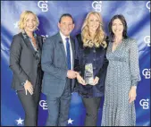  ?? ?? Coldwell Banker Premier Realty Realtor Diane Varney, center, won the award in the Gross Commission Income Medalists (Individual) division. From left is Jamie Duran and Bob and Molly Hamrick.