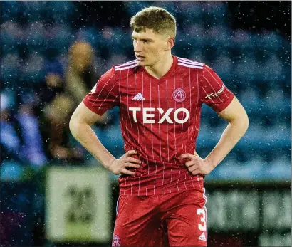  ?? ?? Aberdeen defender Jack MacKenzie was desperatel­y disappoint­ed with the defeat at Rugby Park