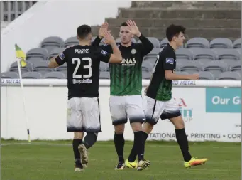  ??  ?? Aaron Greene high fives Jason Marks after his second goal during the Bray Wanderers v Galway United clash at the Carlisle Grounds last weekend.