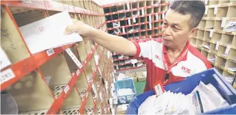  ??  ?? Pos Malaysia is suffering from an environmen­t of elevated opex, with some analysts believing that the national postal delivery service’s outlook remains challengin­g in the short term.