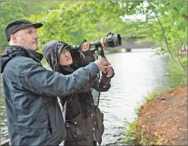  ?? Daniel McFadden 20th Century Fox ?? DIRECTOR Jennifer Yuh Nelson is shown on the set of her summer film “The Darkest Minds” with cinematogr­apher Kramer Morgenthau.