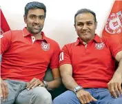  ??  ?? Newly-appointed Kings XI skipper R. Ashwin and Virender Sehwag, mentor of the team.